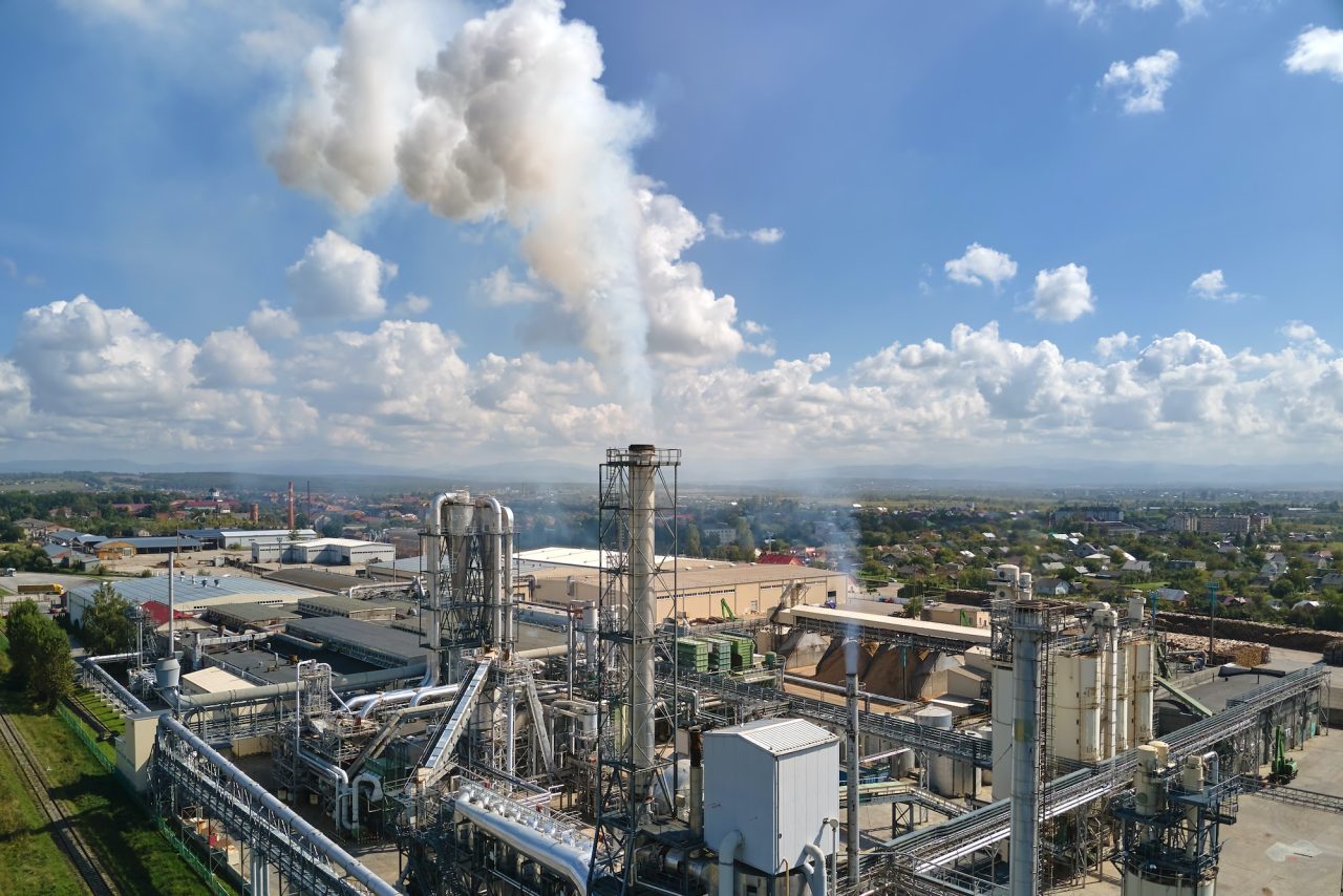 Aerial view of oil and gas refining petrochemical factory with high refinery plant manufacture